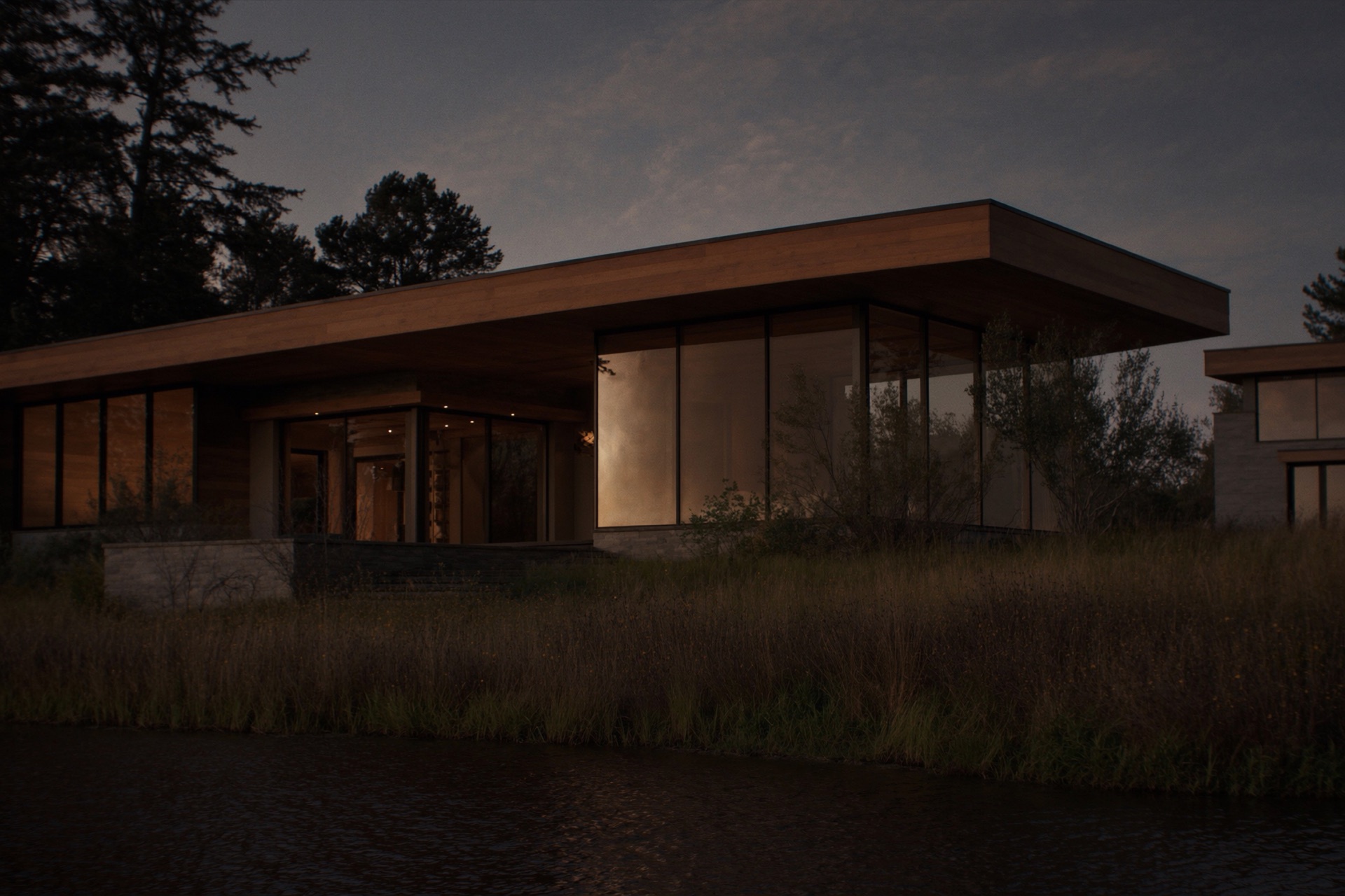 Cedar Point — a long, low lake house at dusk on Lake Minnetonka, interior lights glowing beneath mature burr oaks